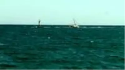Yan yatan yattaki 2 kişi sahil güvenlik ekiplerince kurtarıldı Yan yatan yattaki 2 kişi sahil güvenlik ekiplerince kurtarıldı