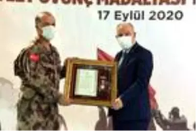 Son dakika gündem: Kahramanmaraş'ta 23 şehit yakını ve gaziye 'Devlet Övünç Madalyası' verildi Son dakika gündem: Kahramanmaraş'ta 23 şehit yakını ve gaziye 'Devlet Övünç Madalyası' verildi