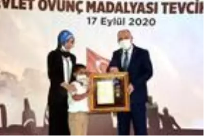 Son dakika gündem: Kahramanmaraş'ta 23 şehit yakını ve gaziye 'Devlet Övünç Madalyası' verildi Son dakika gündem: Kahramanmaraş'ta 23 şehit yakını ve gaziye 'Devlet Övünç Madalyası' verildi