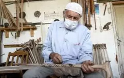 Yarım asırdır ceviz ağaçlarını sanat eseri bastonlara dönüştürüyor Yarım asırdır ceviz ağaçlarını sanat eseri bastonlara dönüştürüyor