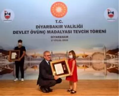 Diyarbakır'da devlet övünç madalyası tevcih töreni yapıldı Diyarbakır'da devlet övünç madalyası tevcih töreni yapıldı
