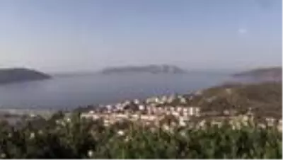 Meis Adası'ndaki insan hareketliliği Kaş'tan rahatça görülebiliyor Meis Adası'ndaki insan hareketliliği Kaş'tan rahatça görülebiliyor