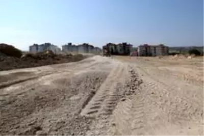 Pınarkent'te beton kilit parke döşeme çalışmaları başladı Pınarkent'te beton kilit parke döşeme çalışmaları başladı