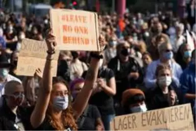 - Berlin'de Moria'daki mülteciler için miting düzenlendi - Berlin'de Moria'daki mülteciler için miting düzenlendi