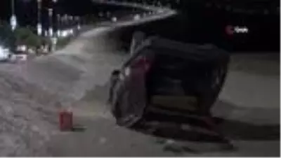 Refüje çarpan otomobil takla attı, sürücü yaralı kurtuldu Refüje çarpan otomobil takla attı, sürücü yaralı kurtuldu