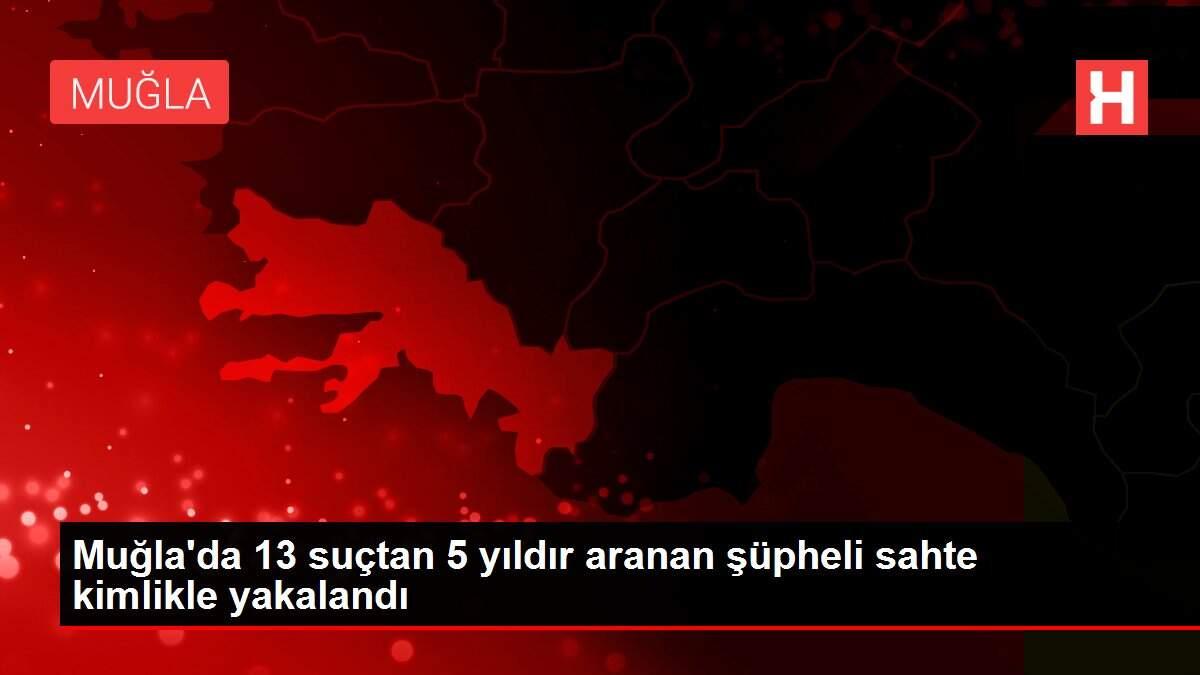 Muğla'da 13 suçtan 5 yıldır aranan şüpheli sahte kimlikle yakalandı Muğla'da 13 suçtan 5 yıldır aranan şüpheli sahte kimlikle yakalandı