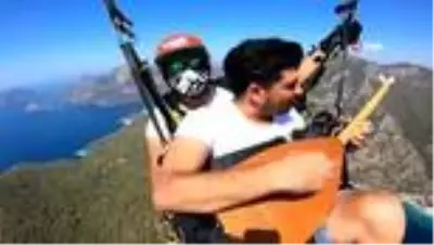 Son dakika haber | Paraşütle saz çalıp Neşet Ertaş'ı andı Son dakika haber | Paraşütle saz çalıp Neşet Ertaş'ı andı