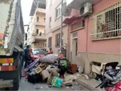 Çöp evden bidon bidon madeni ve kağıt para çıktı Çöp evden bidon bidon madeni ve kağıt para çıktı