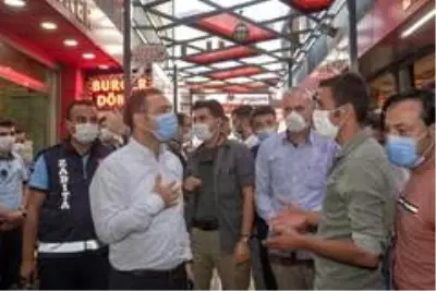 Kaymakam Aslan'dan taraftar sokak esnafına ziyaret Kaymakam Aslan'dan taraftar sokak esnafına ziyaret