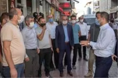 Kaymakam Aslan'dan taraftar sokak esnafına ziyaret Kaymakam Aslan'dan taraftar sokak esnafına ziyaret