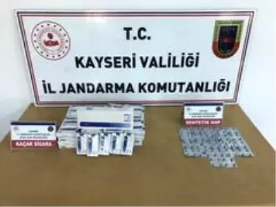 Jandarma sentetik hap ve kaçak sigara yakaladı Jandarma sentetik hap ve kaçak sigara yakaladı