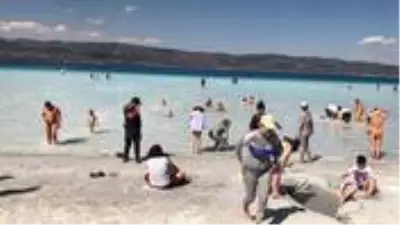 Salda Gölü'nün 'Beyaz Adalar' bölgesinde göle ve plaja giriş yasaklandı Salda Gölü'nün 'Beyaz Adalar' bölgesinde göle ve plaja giriş yasaklandı