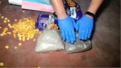 Cips poşetinde uyuşturucu madde taşırken yakalandılar Cips poşetinde uyuşturucu madde taşırken yakalandılar