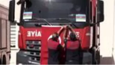 Şanlıurfa'da itfaiyecilerden Azerbaycan'a bayraklı destek Şanlıurfa'da itfaiyecilerden Azerbaycan'a bayraklı destek