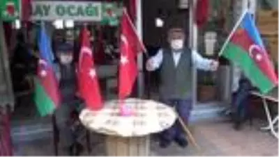 Kahramankazan'da esnafa Azerbaycan ve Türk bayrakları dağıtıldı Kahramankazan'da esnafa Azerbaycan ve Türk bayrakları dağıtıldı