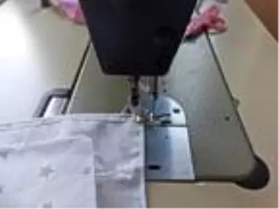 Tunceli'de usta öğreticiler, öğrenciler için 30 bin maske üretti Tunceli'de usta öğreticiler, öğrenciler için 30 bin maske üretti