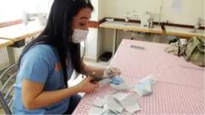 HEM kursiyerleri imeceyle maske dikiyor HEM kursiyerleri imeceyle maske dikiyor