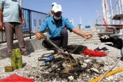 Fethiye'de dalgıçlar denizin dibini temizledi Fethiye'de dalgıçlar denizin dibini temizledi