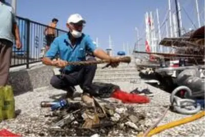 Fethiye'de dalgıçlar denizin dibini temizledi Fethiye'de dalgıçlar denizin dibini temizledi