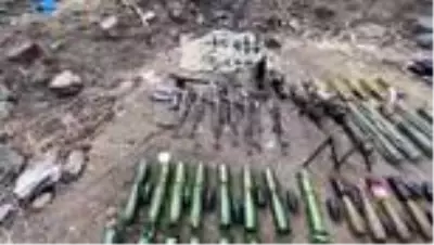 Irak'ın kuzeyinde terör örgütü PKK'ya ait silah ve mühimmat ele geçirildi Irak'ın kuzeyinde terör örgütü PKK'ya ait silah ve mühimmat ele geçirildi