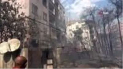 Polis memuru, yangını söndürmek için canla başla müdahale etti Polis memuru, yangını söndürmek için canla başla müdahale etti