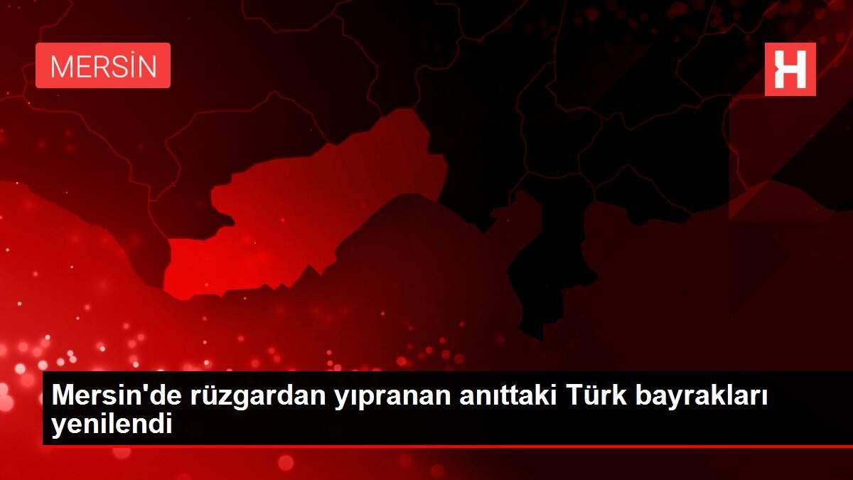 Mersin'de rüzgardan yıpranan anıttaki Türk bayrakları yenilendi Mersin'de rüzgardan yıpranan anıttaki Türk bayrakları yenilendi