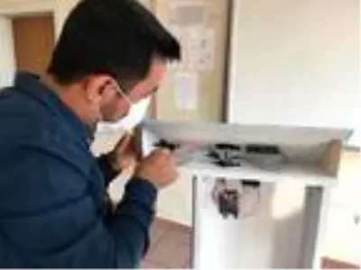 Ateş ölçümü ve dezenfektanın bir arada olduğu ünite üretildi Ateş ölçümü ve dezenfektanın bir arada olduğu ünite üretildi