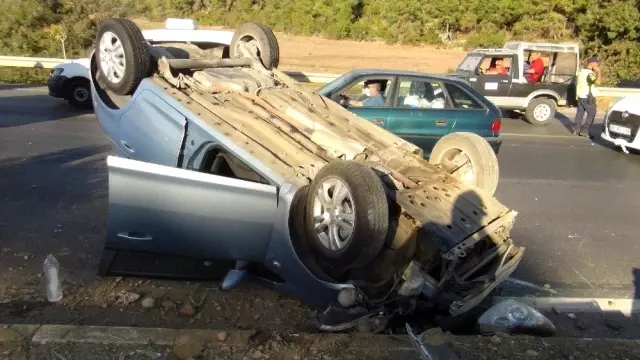 Takla atan otomobilden burnu bile kanamadan çıktı