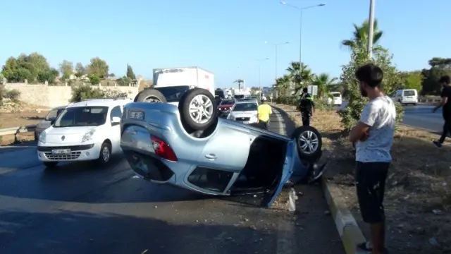 Takla atan otomobilden burnu bile kanamadan çıktı