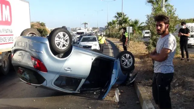 Takla atan otomobilden burnu bile kanamadan çıktı