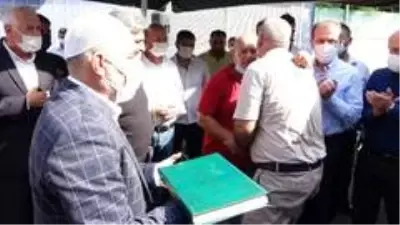Husumetli iki aile Kur'an'a el basıp yemin ederek barıştı Husumetli iki aile Kur'an'a el basıp yemin ederek barıştı
