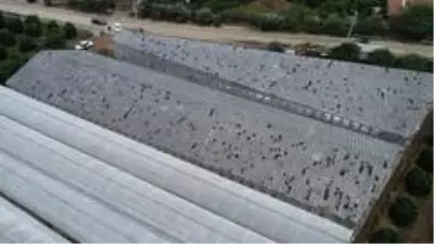 Antalya'da zarar gören seralar havadan görüntülendi Antalya'da zarar gören seralar havadan görüntülendi