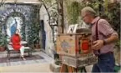 Kendi yaptığı, 150 yıllık teknikle çalışan makinesiyle hatıra fotoğrafları çekiyor Kendi yaptığı, 150 yıllık teknikle çalışan makinesiyle hatıra fotoğrafları çekiyor