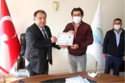 Orman yangınına müdahale eden çiftçi aileye teşekkür belgesi Orman yangınına müdahale eden çiftçi aileye teşekkür belgesi