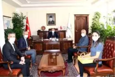 Adıyaman'da PTT'den Vali Çuhadar'a ziyaret Adıyaman'da PTT'den Vali Çuhadar'a ziyaret