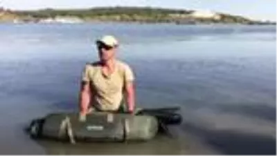 Amatör balıkçı yakaladığı 27,5 kilogramlık sazanı gölete bıraktı Amatör balıkçı yakaladığı 27,5 kilogramlık sazanı gölete bıraktı