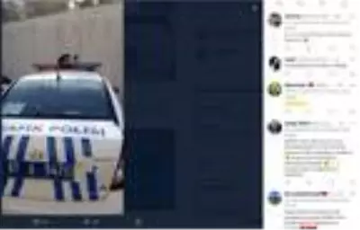 Son dakika haber | Ekip otosunun tepe lambasına çıkan kediye polislerden mama Son dakika haber | Ekip otosunun tepe lambasına çıkan kediye polislerden mama