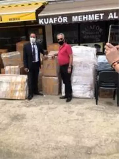 Van'dan Giresun'daki selden zarar gören berber ve kuaförlere destek Van'dan Giresun'daki selden zarar gören berber ve kuaförlere destek