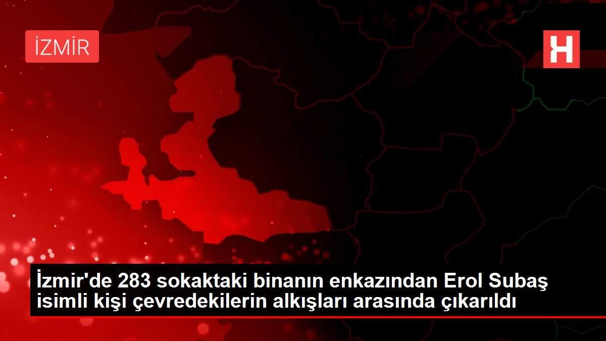 İzmir'de 283 sokaktaki binanın enkazından Erol Subaş isimli kişi çevredekilerin alkışları arasında çıkarıldı