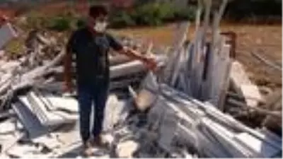 Yangın sırasında belediyenin dozerinin iş yerine zarar verdiği iddiası Yangın sırasında belediyenin dozerinin iş yerine zarar verdiği iddiası