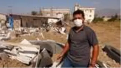 Yangın sırasında belediyenin dozerinin iş yerine zarar verdiği iddiası Yangın sırasında belediyenin dozerinin iş yerine zarar verdiği iddiası