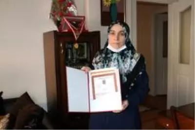 Bakan Soylu'dan gelen haber şehit eşini mutlu etti Bakan Soylu'dan gelen haber şehit eşini mutlu etti