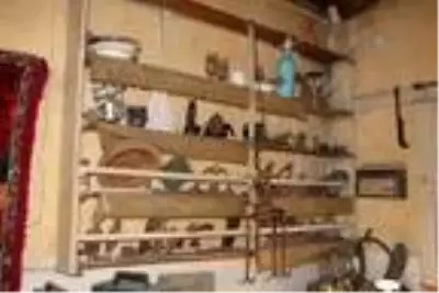 Dışı gazoz kapaklarıyla kaplı ev ilgi çekiyor Dışı gazoz kapaklarıyla kaplı ev ilgi çekiyor
