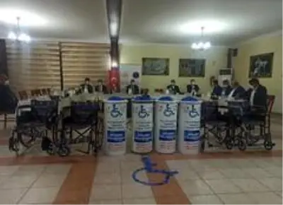 Tekerlekli sandalyeler şehit isimleriyle dağıtıldı Tekerlekli sandalyeler şehit isimleriyle dağıtıldı