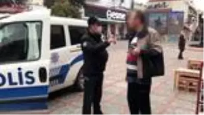 Kamuya açık alanda sigara içen ve maske takmayan kişiye ceza uygulandı Kamuya açık alanda sigara içen ve maske takmayan kişiye ceza uygulandı