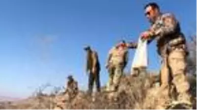 Kars'ta avcılar avlamak yerine bu kez yemledi Kars'ta avcılar avlamak yerine bu kez yemledi