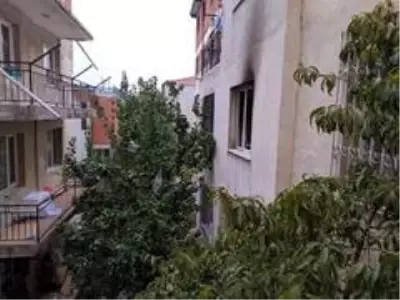 Alevlerden kaçmak için balkondan atladı Alevlerden kaçmak için balkondan atladı