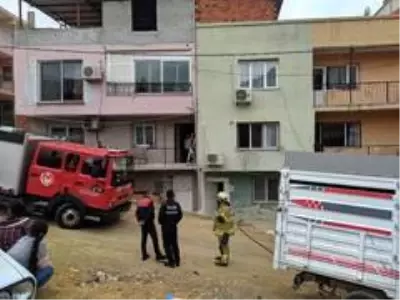Alevlerden kaçmak için balkondan atladı Alevlerden kaçmak için balkondan atladı