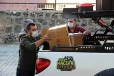 Offroad kulübü ortaokul öğrencilerine kışlık kıyafet yardımı yaptı Offroad kulübü ortaokul öğrencilerine kışlık kıyafet yardımı yaptı