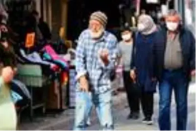 Dilenci kılığına girip yarım saatte 60 TL para topladı Dilenci kılığına girip yarım saatte 60 TL para topladı